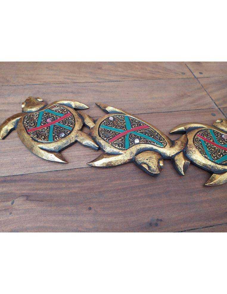 Tortugas en madera con resina Origen: Indonesia